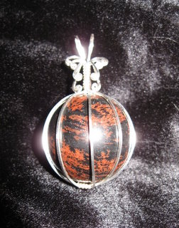 P-38 Mahogany obsidian sphere wrapped in sterling silver $35.jpg